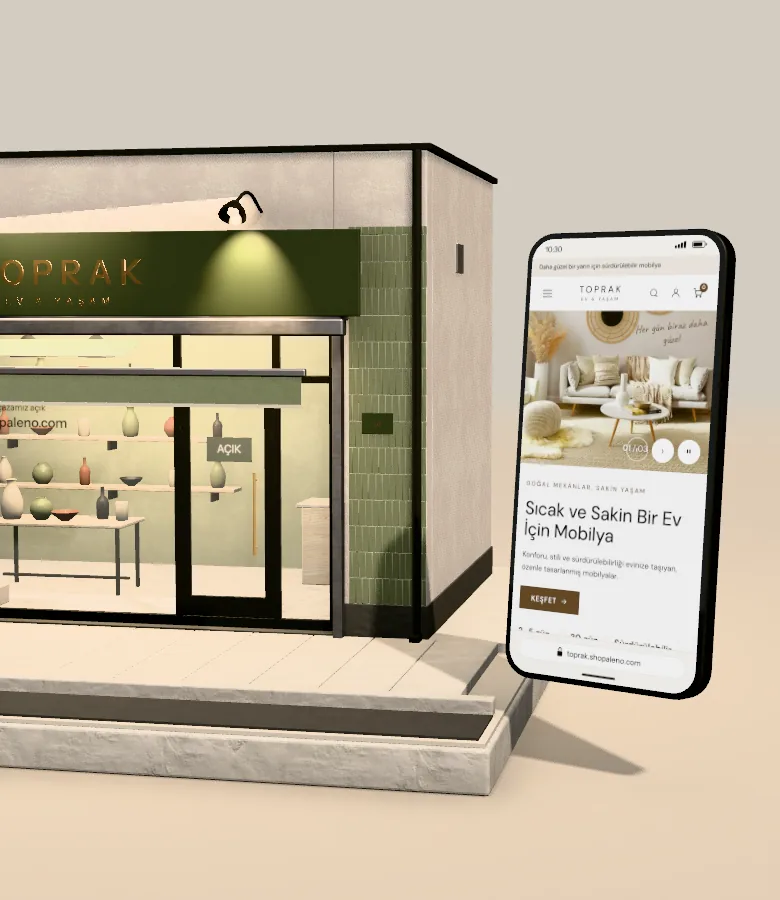 Telefon standda dik duruyor; ekranda aynı mağazanın Huzur temalı ana sayfası ve toprak.shopaleno.com adresi var.